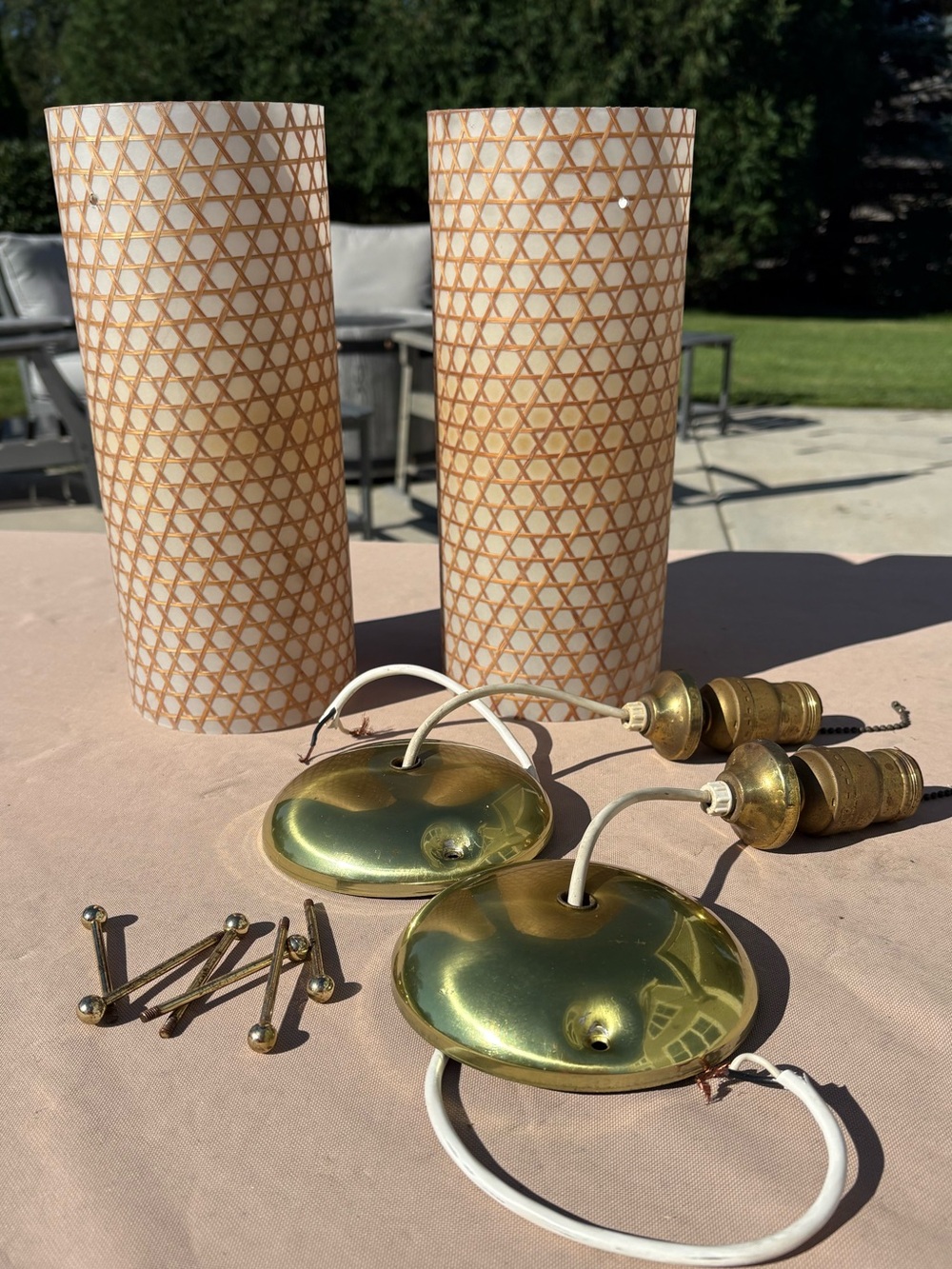 A pair vintage Mid-Century Modern pendant lighting